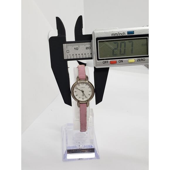 Timex Carriage women\'s watch. Silver face. Pink Band. CR1216CELL. N8